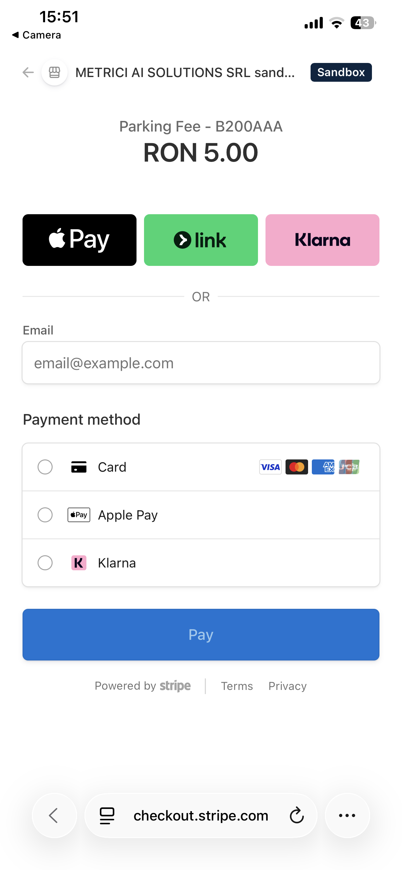 Stripe-hosted checkout page on a mobile phone showing the merchant 'METRICI AI SOLUTIONS SRL sand...', the line item 'Parking Fee - B200AAA' priced at RON 5.00, quick-pay buttons for Apple Pay, Link, and Klarna, an email field, and a Payment method list with Card, Apple Pay, and Klarna options. A blue Pay button is visible at the bottom.
