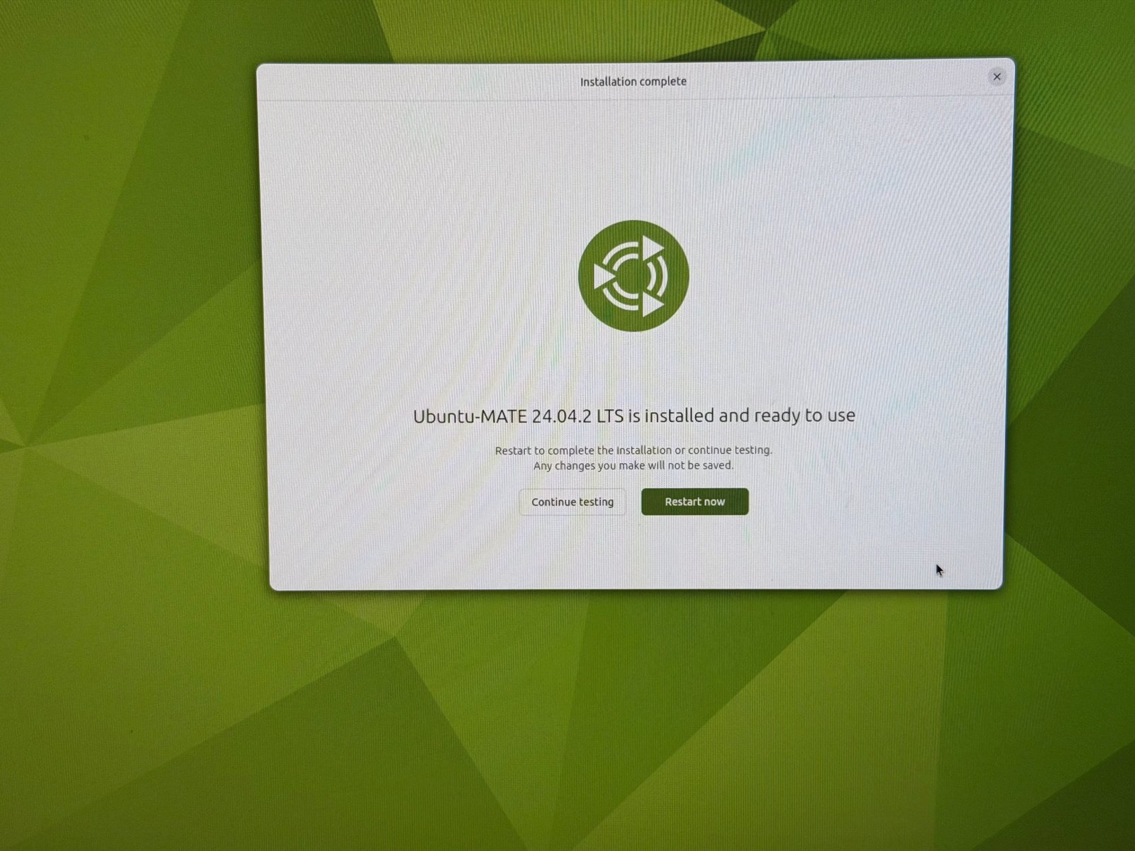 Installation complete screen showing Ubuntu MATE is installed and ready to use, with a Restart now button